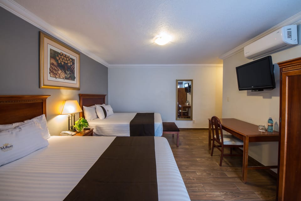 Standard Room, 2 Double Beds | In-room safe, desk, iron/ironing board, free cribs/infant beds