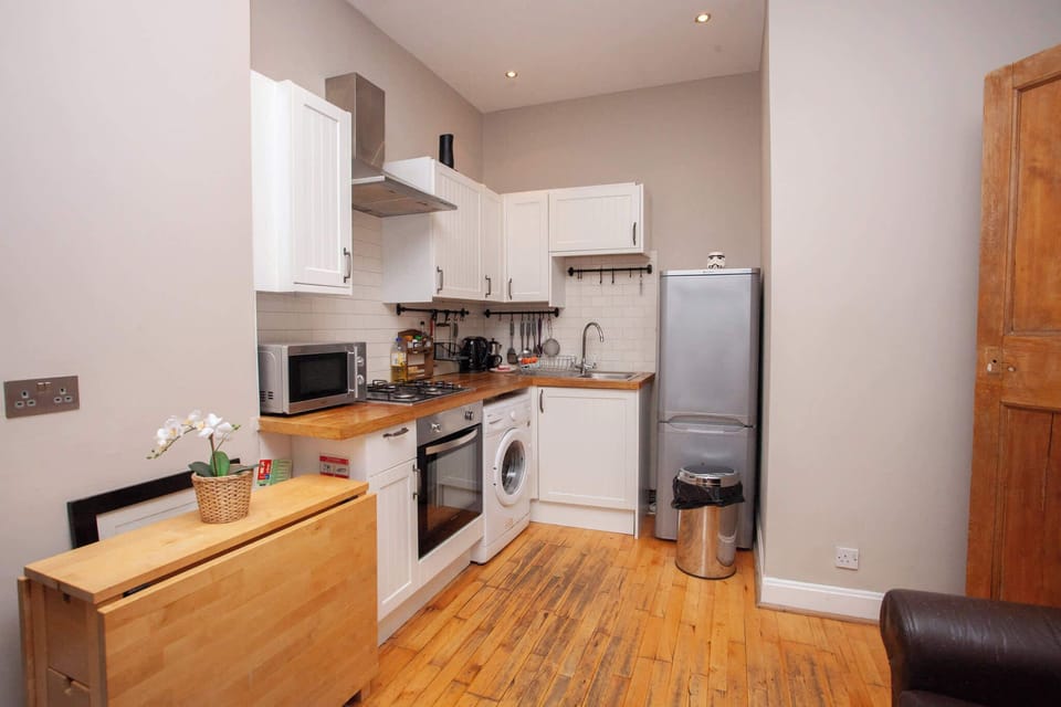 Kitchen with amenities provided