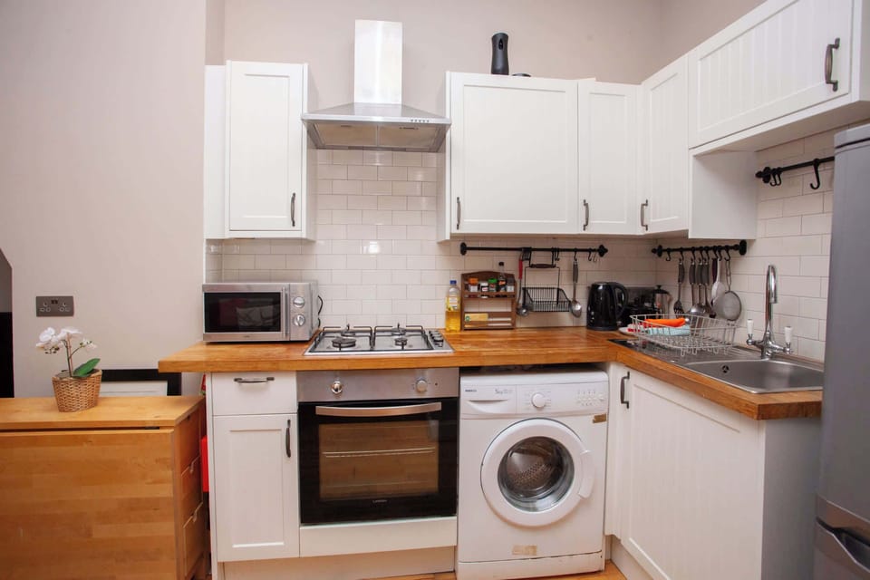 Kitchen with amenities provided