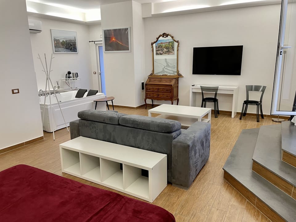 Panoramic Studio Suite, Jetted Tub, Sea View | Desk, laptop workspace, blackout drapes, iron/ironing board