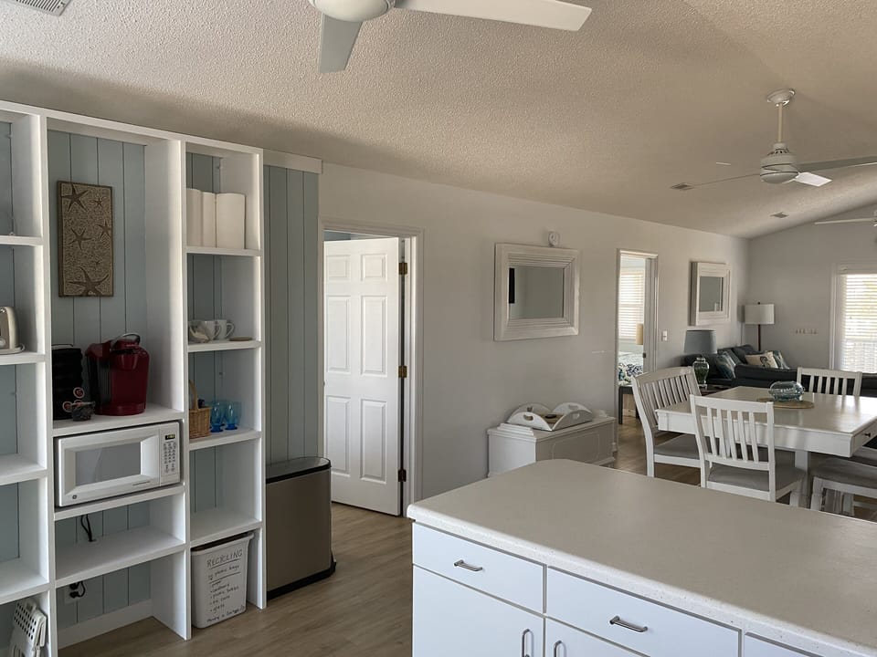 Extra kitchen storage in open shelving. 