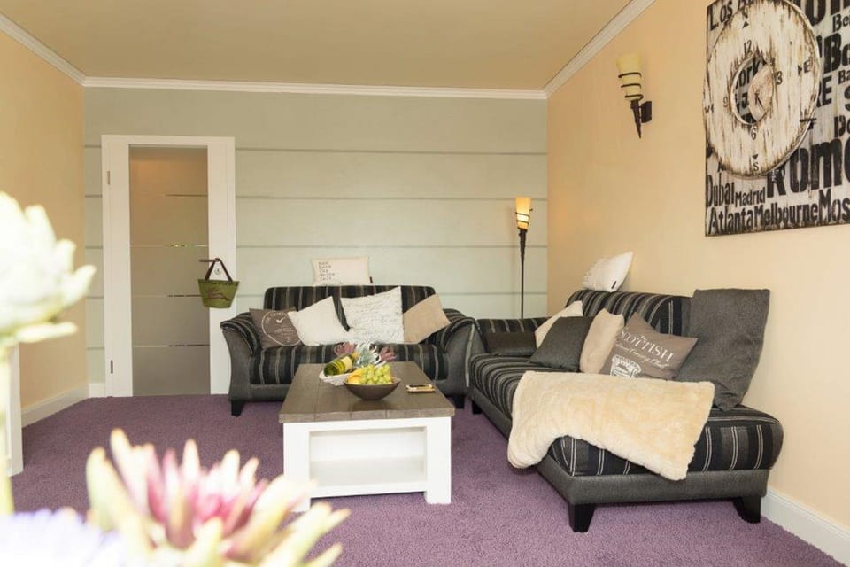 Condo | Living area | 32-inch TV with satellite channels