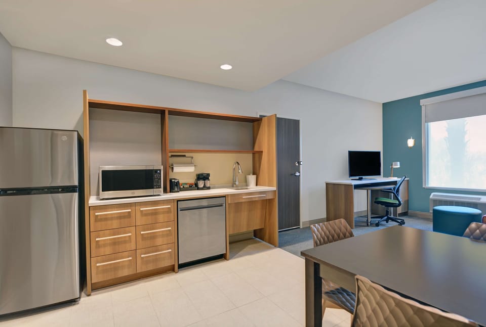 Studio, 1 Queen Bed (Roll-In Shower) | Private kitchen | Full-size fridge, microwave, dishwasher, coffee/tea maker