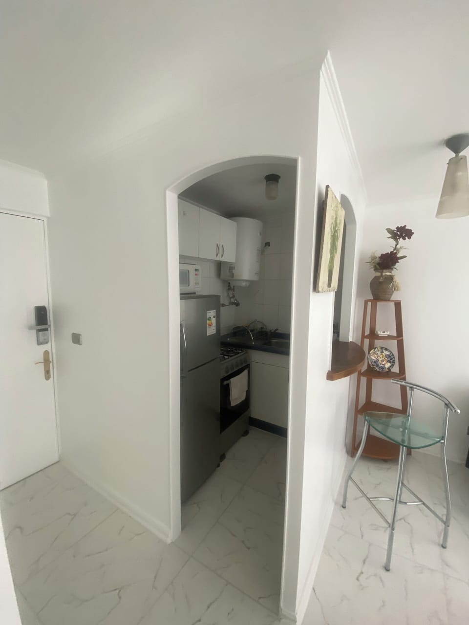 Standard Apartment (304) | Private kitchen | Full-size fridge, microwave, cookware/dishes/utensils