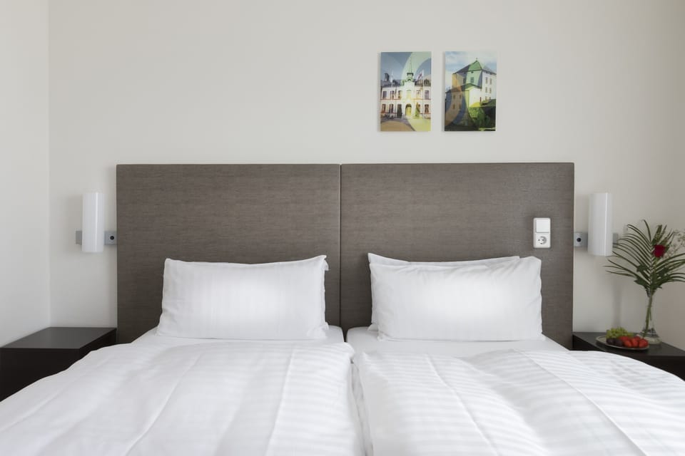 Desk, blackout drapes, WiFi (free), bed sheets