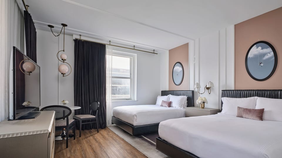 Room, 2 Queen Beds, Corner | Minibar, in-room safe, desk, laptop workspace