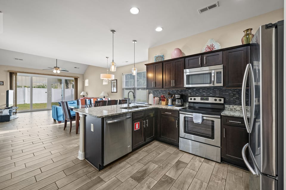 This upscale kitchen is well stocked to make meal prep a breeze.