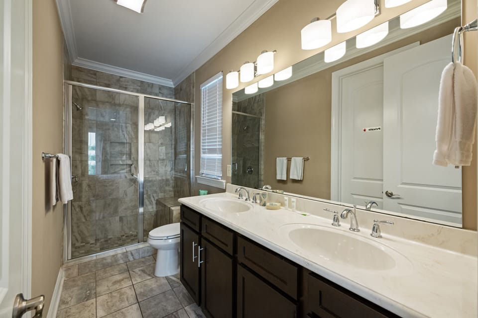 Get ready for a night on the town in this spacious bathroom with double sinks.