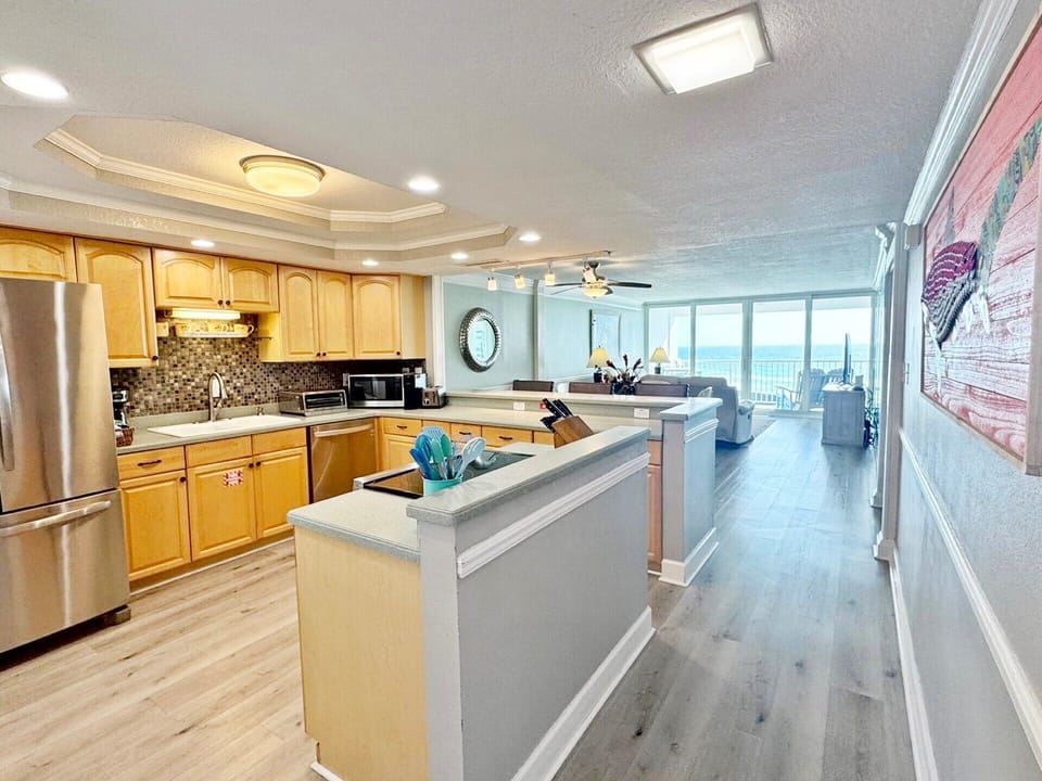 Kitchen and great views as soon as you enter condo. 