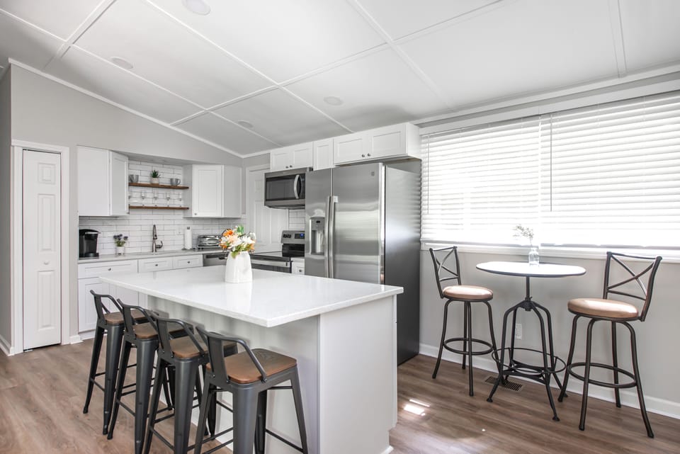 Enjoy eating at breakfast bar or bistro table