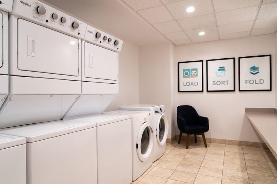 Self-service coin-operated laundry room on-site — washers and dryers available daily for extended-stay guests