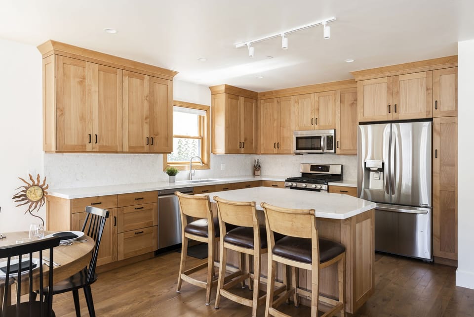 Large kitchen island with bar seating for 3