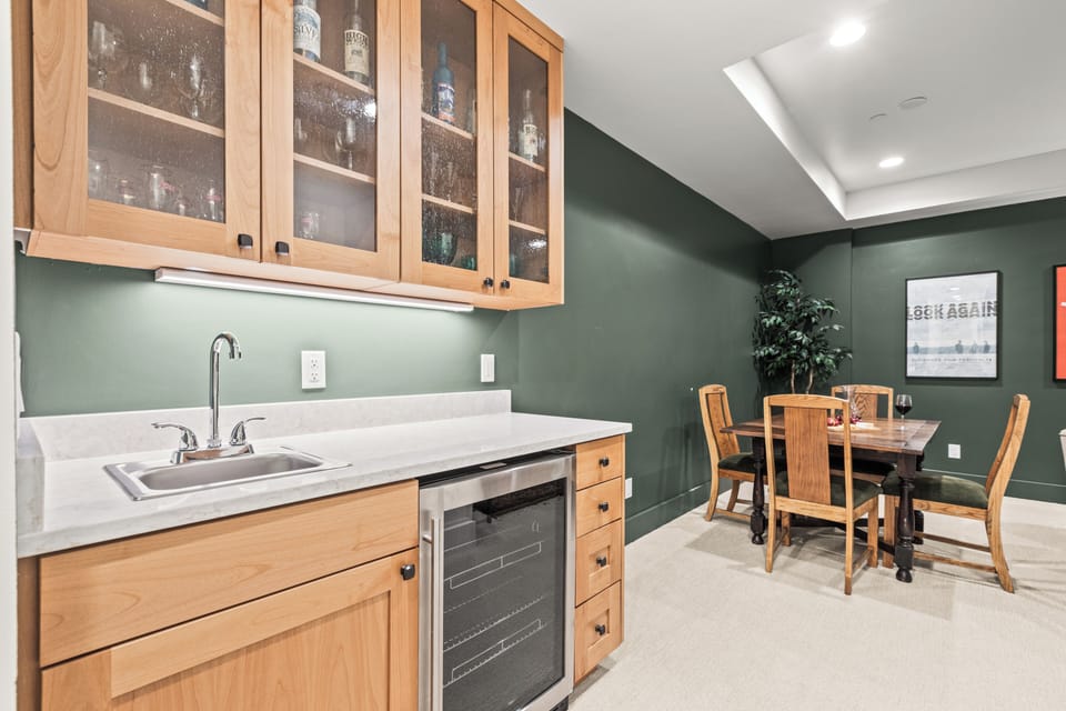 Your elegant kitchenette, perfect for preparing drinks while you relax at the nearby dining table.