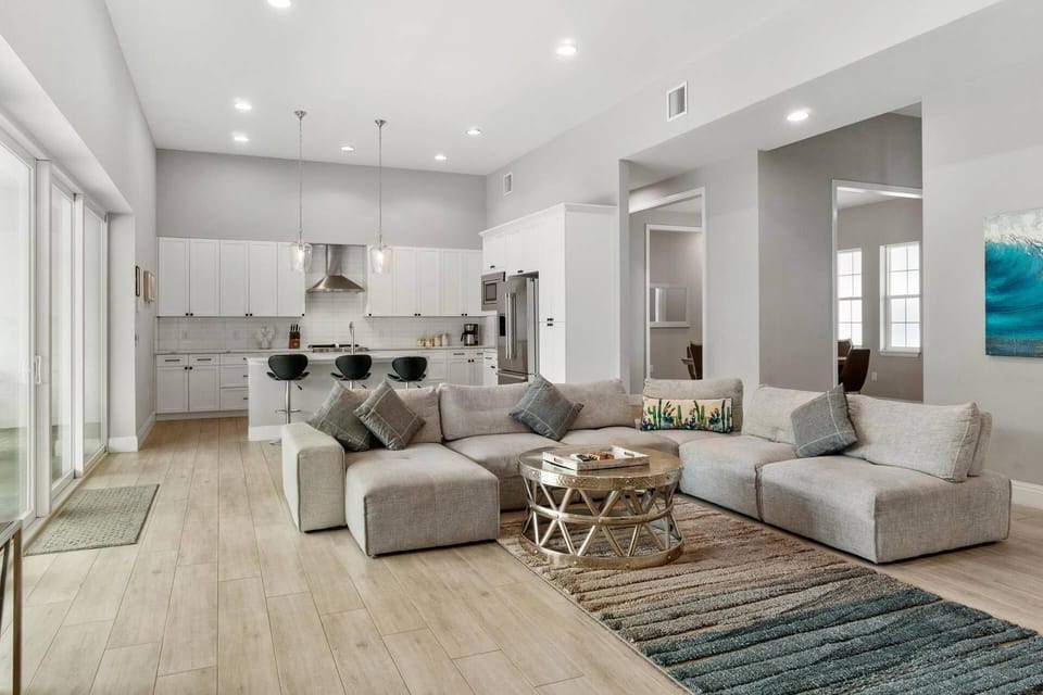The open concept living room flows into the kitchen area so you’re never too far from getting a snack.