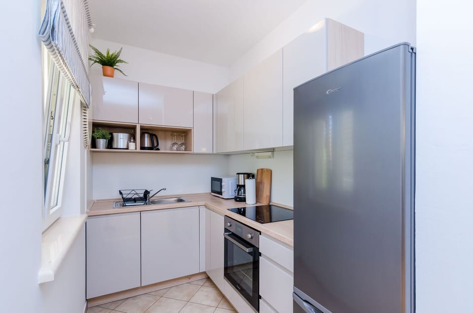 Apartment (2-Bedroom Apt with Garden and Terrace) | Private kitchen | Fridge
