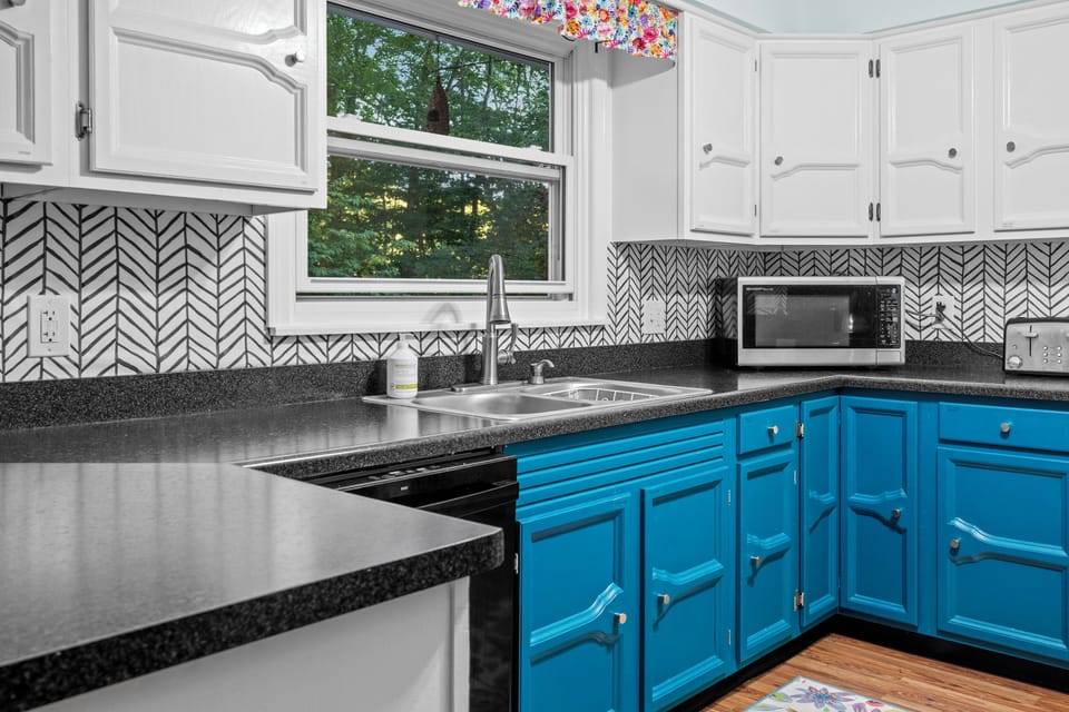 Fully stocked kitchen, including dishwasher, has everything you need to cook 