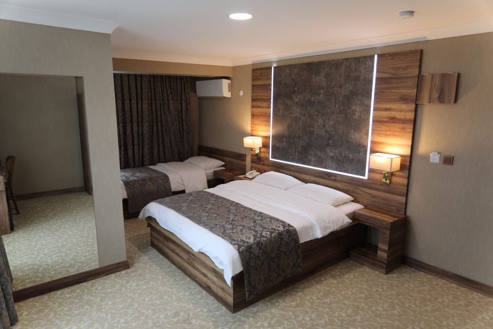 Premium bedding, down comforters, Select Comfort beds, minibar