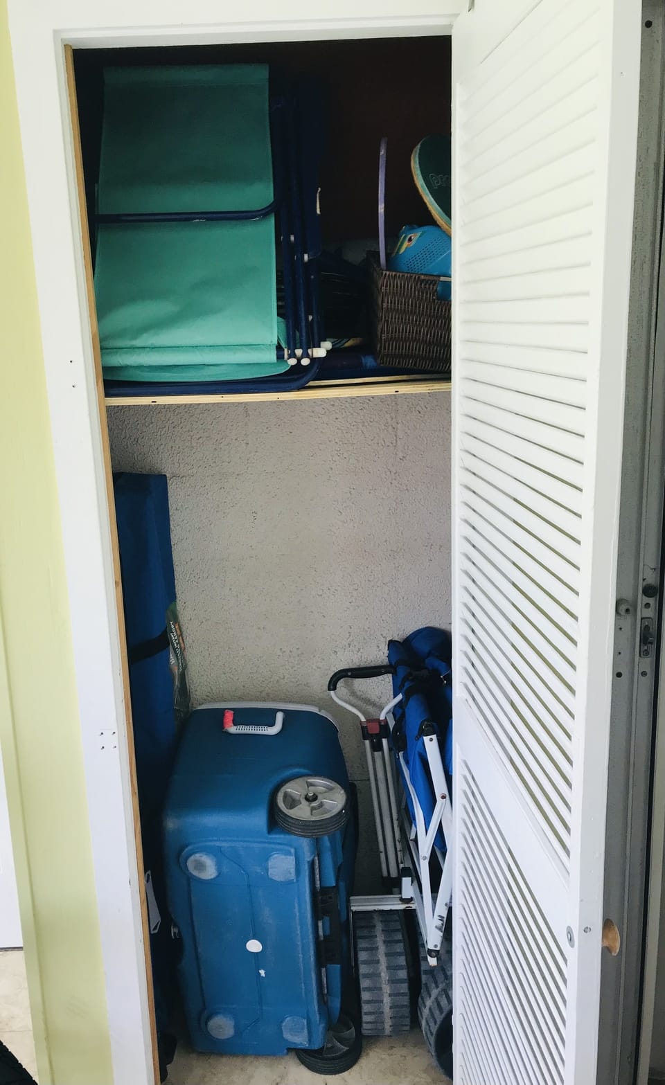 Umbrella, beach canopy, beach wagon, and cooler for you and the family