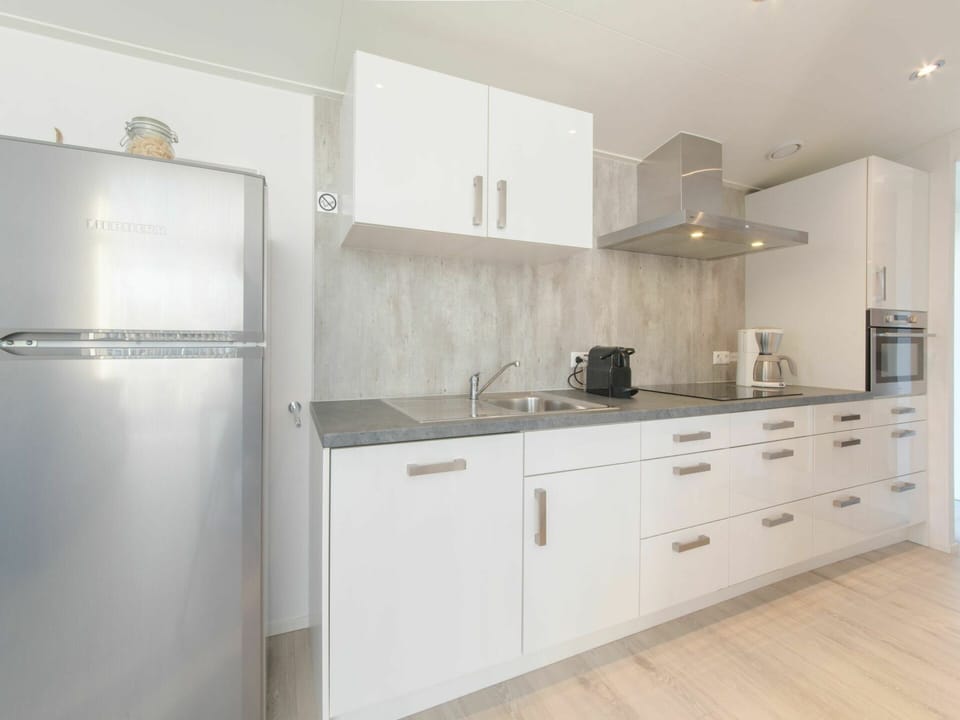 Tap, Cabinetry, Sink, Property, Countertop, Building, Plumbing Fixture, Kitchen Sink, Drawer, Kitchen