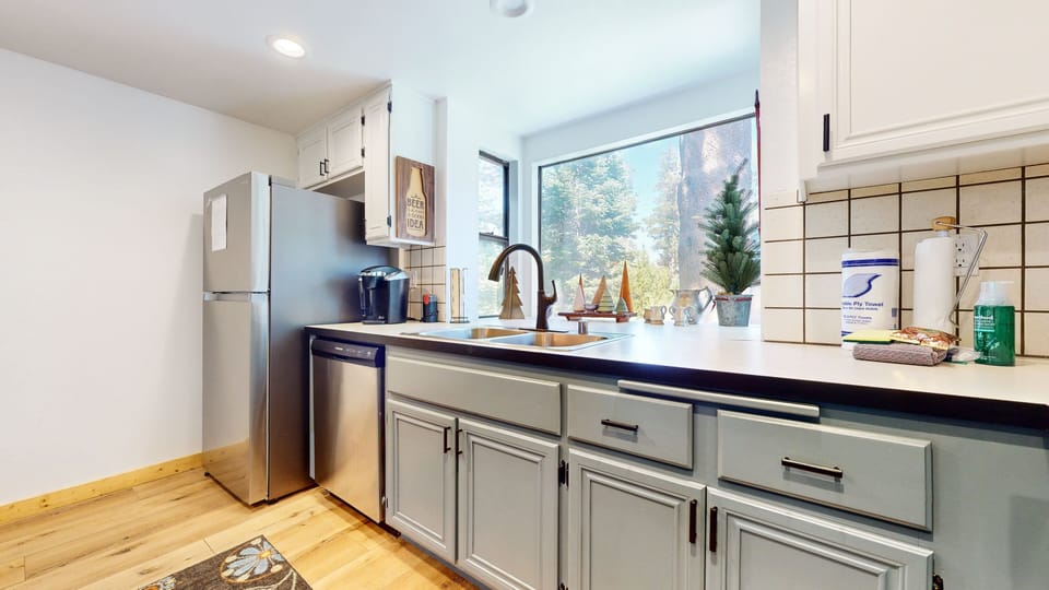 Condo, 2 Bedrooms | Private kitchen | Fridge, microwave, oven, dishwasher