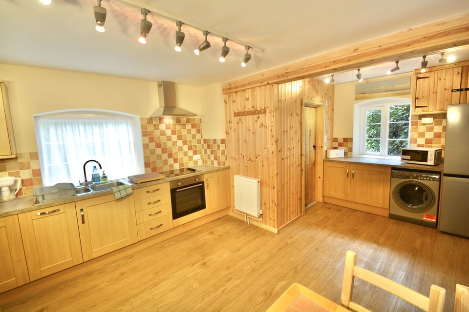 Bright open-plan kitchen with plenty of space for everyone.