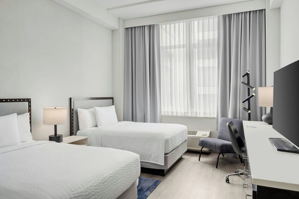 Room, 2 Double Beds | Pillowtop beds, desk, blackout drapes, iron/ironing board