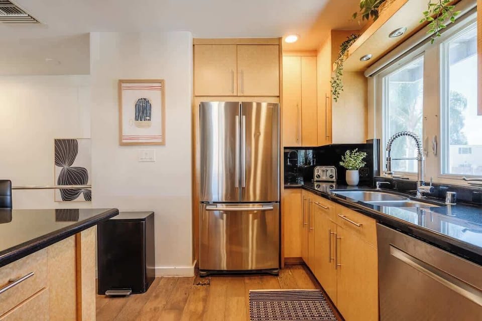 The impressive chef’s kitchen comes fully equipped with everything you need