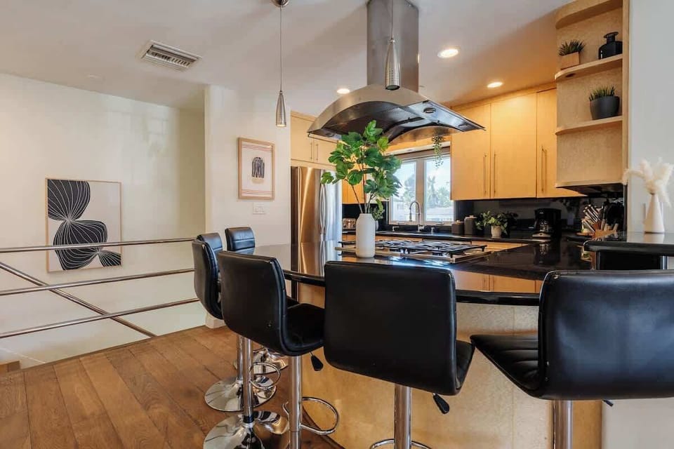 Keep the chef company as you sip your perfectly chilled wine