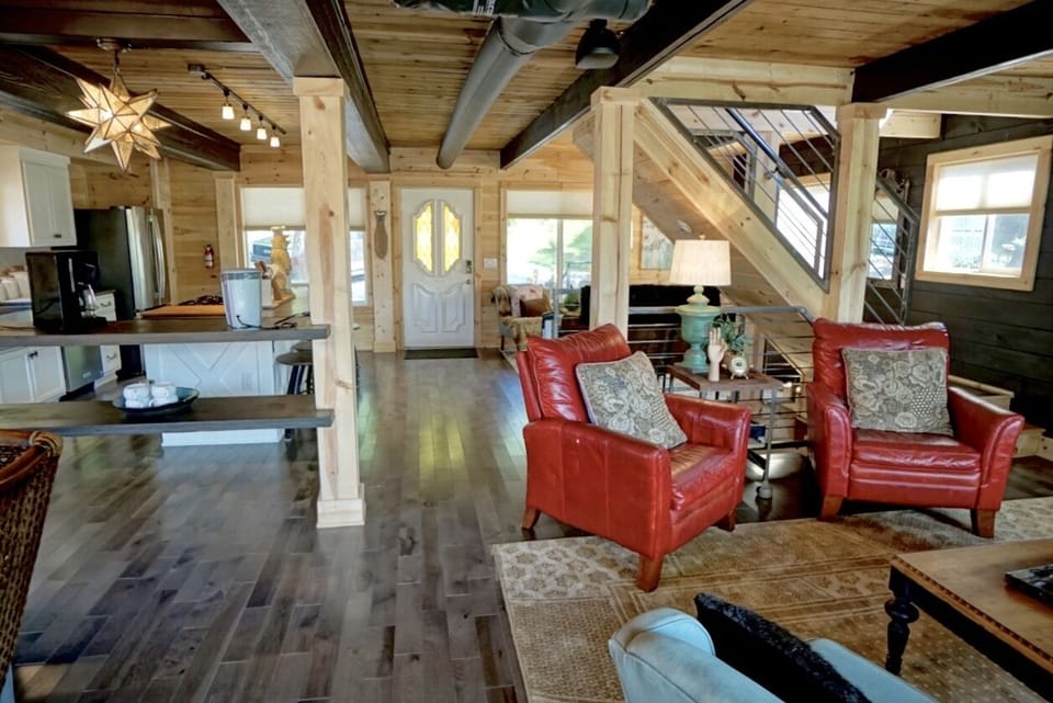 Open concept main floor: Living room, kitchen, dining room, 1/2 bath.