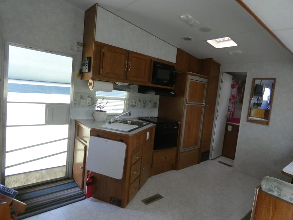 Kitchen area, compact and complete for any meal you want to create