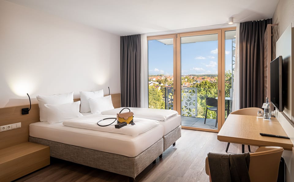 Comfort Room, Balcony | In-room safe, desk, laptop workspace, iron/ironing board (on request)