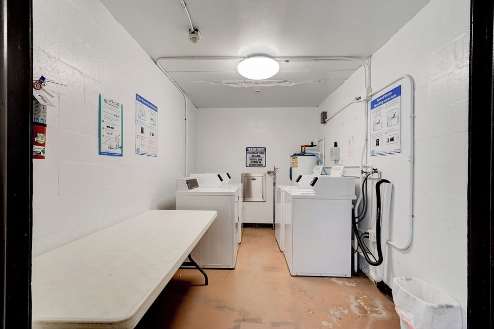 Laundry room on the same and around the corner from the unit

