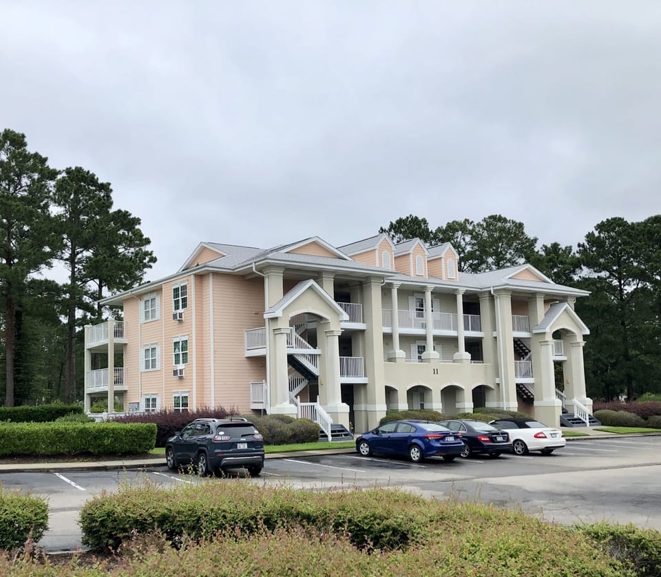 Front of the building and parking lot. 
