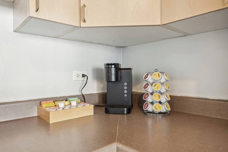 Get caffeinated with our Keurig coffee maker. Tea packets, cream and Splenda are readily available. :)