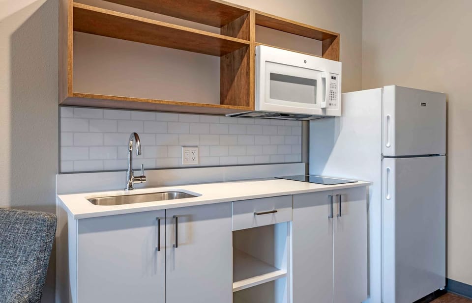 Standard Studio, 2 Queen Beds, Non Smoking | Private kitchen | Full-size fridge, microwave, stovetop, cookware/dishes/utensils