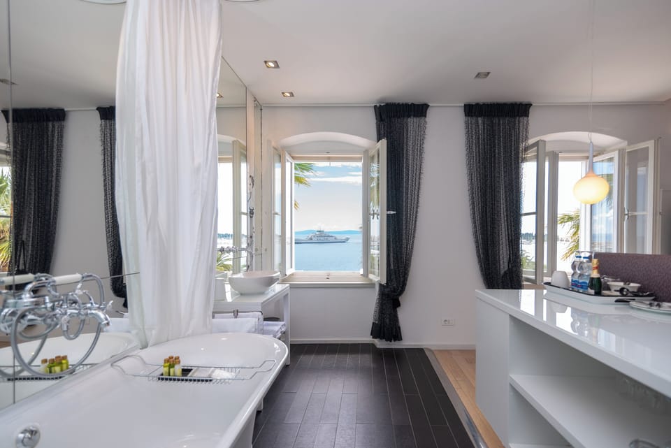 Luxury Suite, Terrace, Sea View | Bathroom | Designer toiletries, hair dryer, bathrobes, towels
