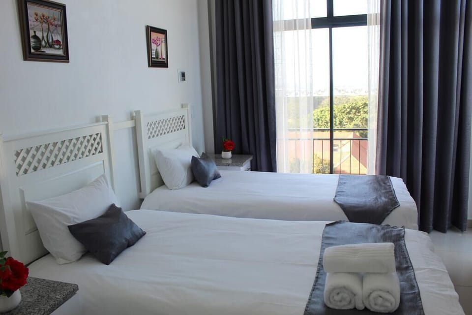 Family Suite | Down comforters, in-room safe, desk, laptop workspace