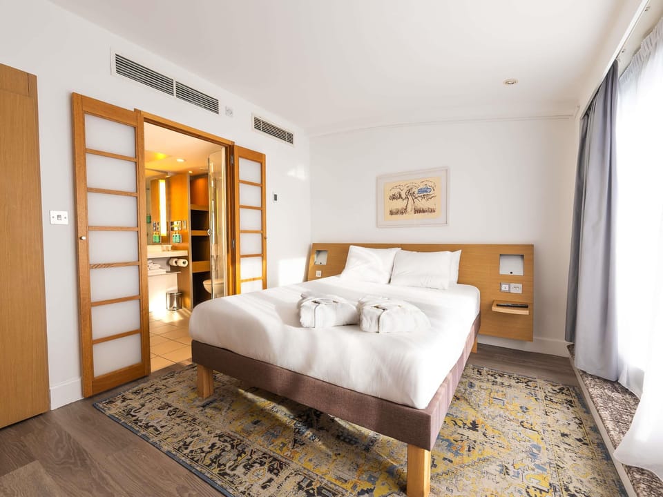 In-room safe, desk, laptop workspace, blackout drapes