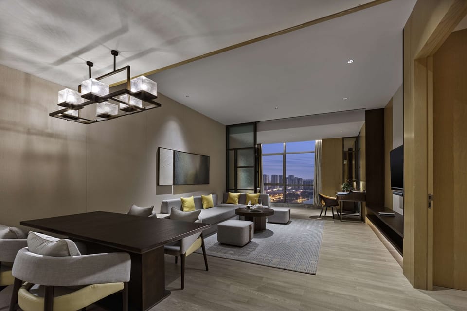 Premium Suite, 1 King Bed, Lake View | Down comforters, in-room safe, desk, laptop workspace