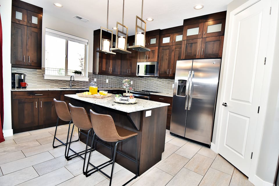 Ent 425 Pristine Clean and Fully Equipped Kitchen with an Island Top Counter