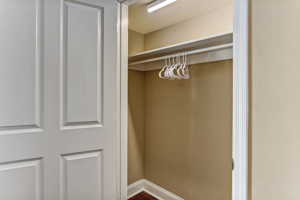 First floor closet.  All bedroom closets are roomy for clothes, shoes & luggage.