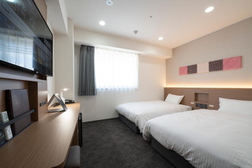 Down comforters, desk, free WiFi, bed sheets