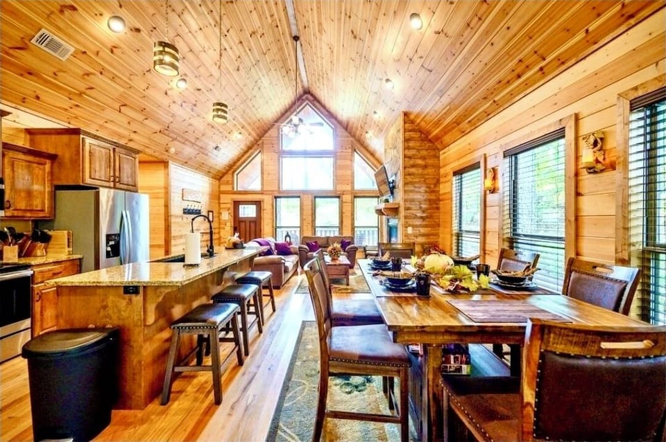 Main living & dining area vaulted ceiling & lots of windows for incredible views