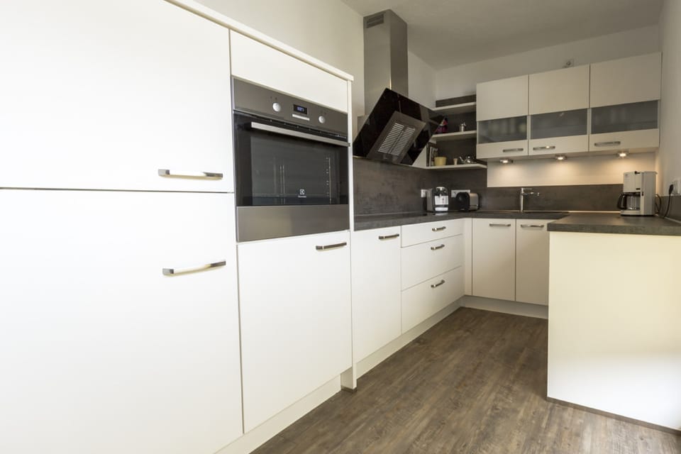 Apartment | Private kitchen | Fridge, oven, stovetop, dishwasher