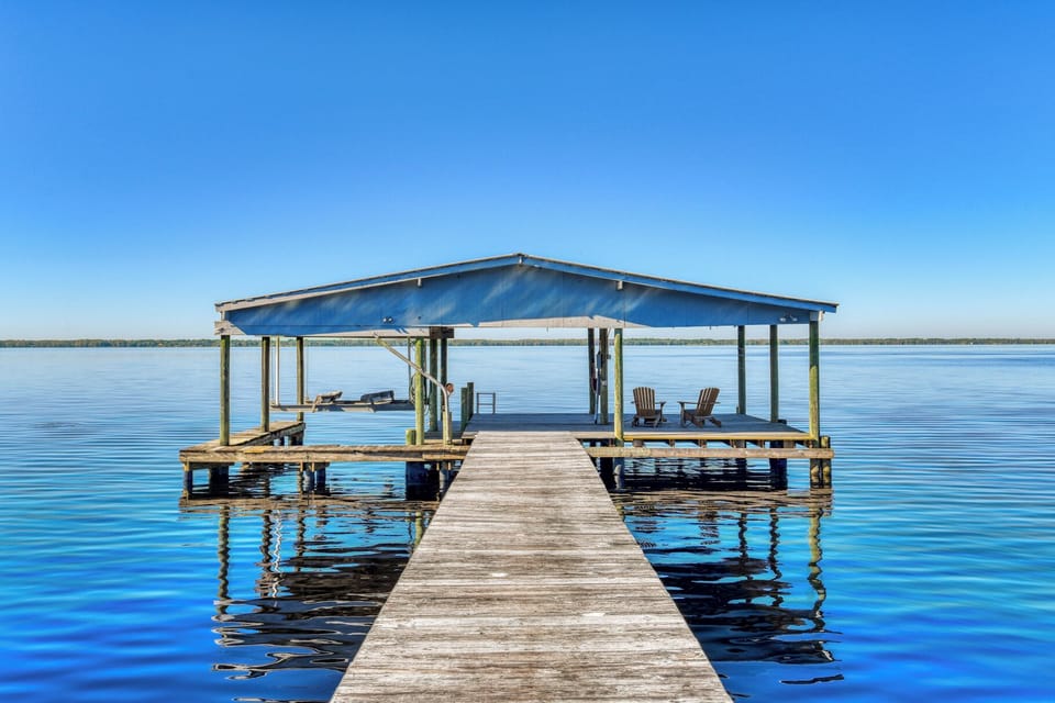 the dock and boat lift can accommodate a boat up to 21 ft.