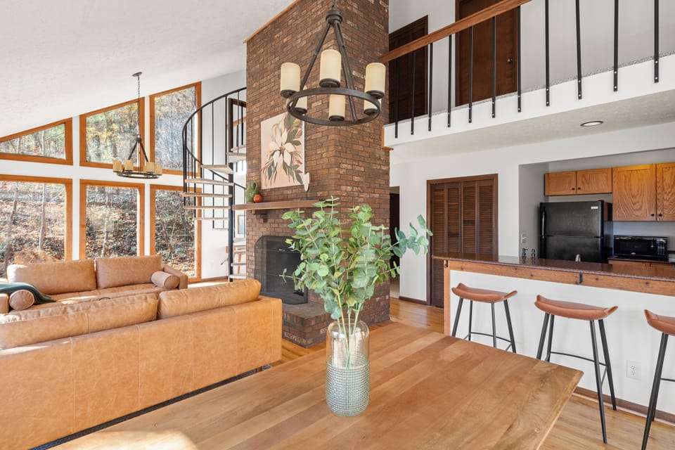 Vaulted ceilings create a sun drenched, inviting space
