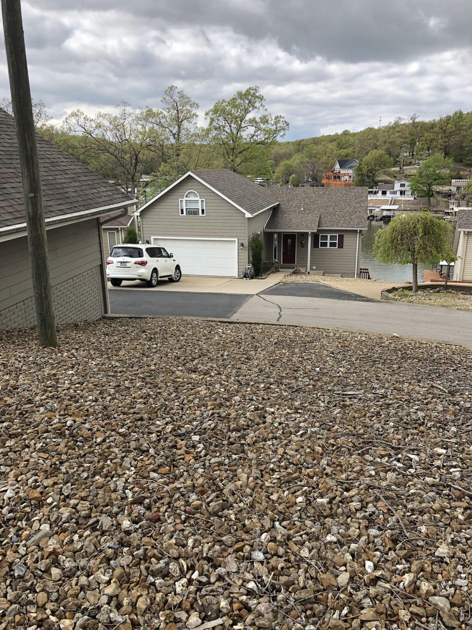 Home exterior plus empty lot included for parking