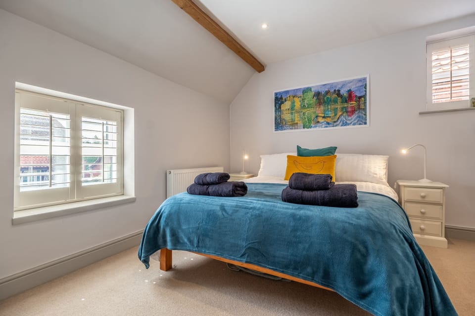Sherbet Cottage, South Creake: One of the two inviting bedrooms at the cottage