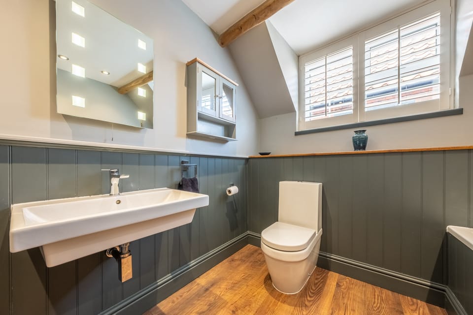 First floor: Family bathroom with separate bath and shower