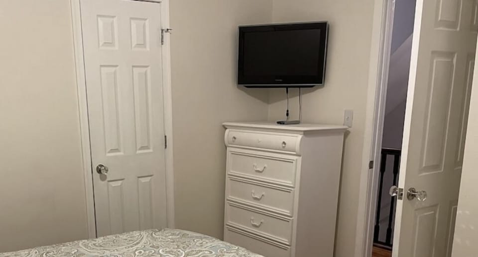 2nd Floor: 
Bedroom #3 with King Bed, 1 closet, TV and a ceiling fan